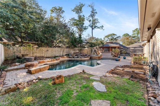 view of swimming pool featuring a gazebo and a patio area