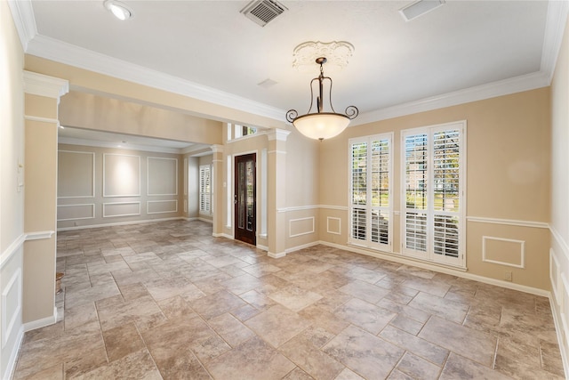 unfurnished dining area with ornate columns and ornamental molding