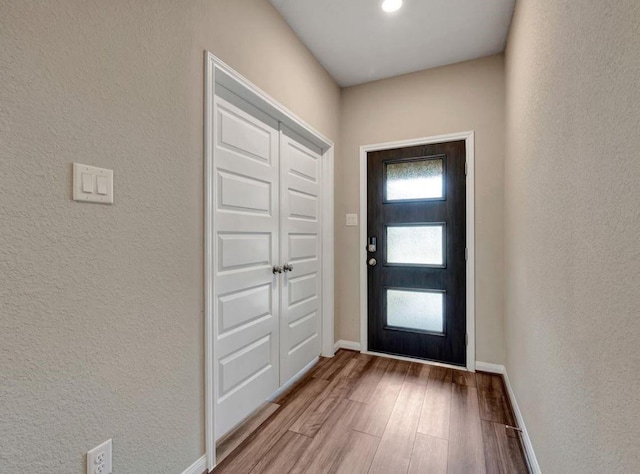 doorway featuring hardwood / wood-style floors