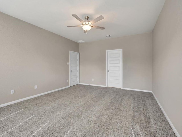 unfurnished room featuring carpet flooring and ceiling fan