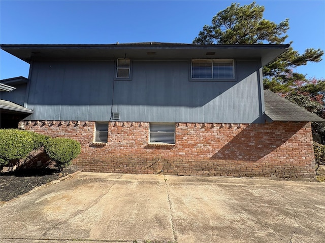 view of home's exterior with a patio