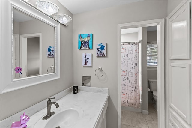 full bathroom featuring toilet, tile patterned flooring, shower / bath combo with shower curtain, and vanity