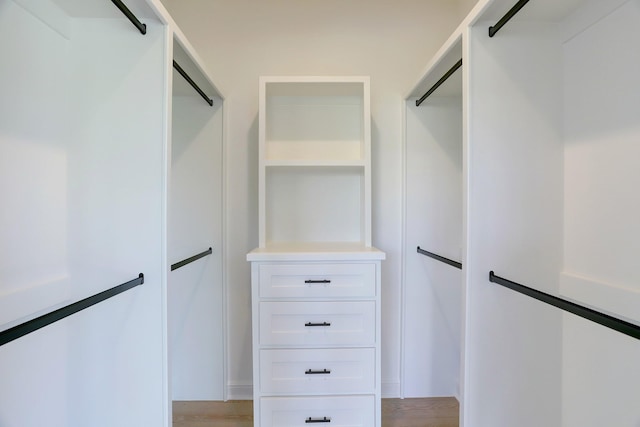 walk in closet featuring light wood-type flooring