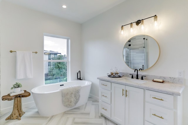 bathroom featuring separate shower and tub and vanity