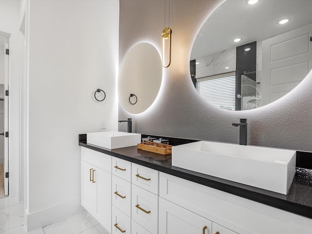 bathroom featuring vanity and walk in shower