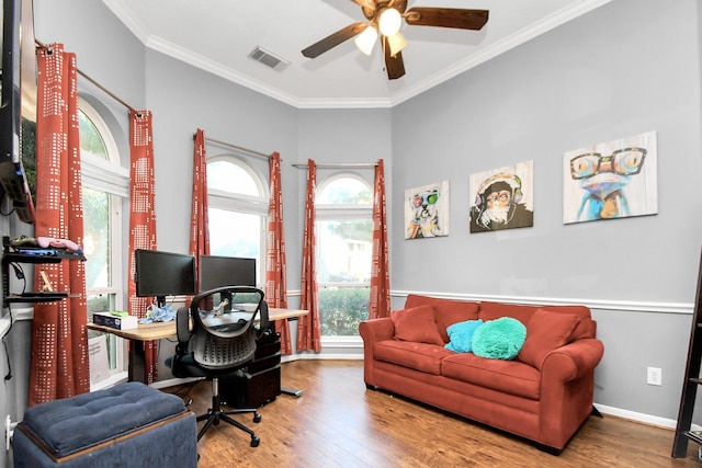 office with wood-type flooring, ceiling fan, and crown molding