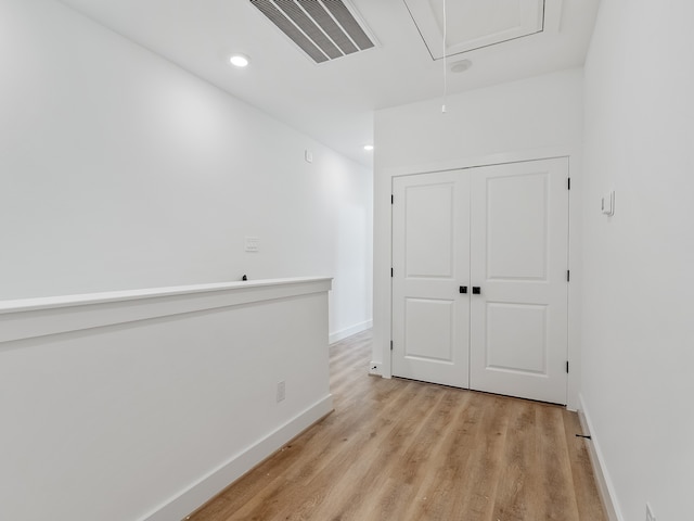 hall featuring light hardwood / wood-style flooring