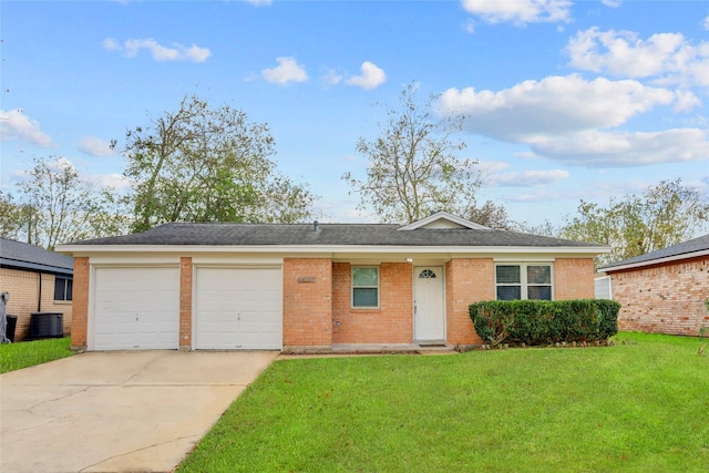 single story home with central AC, a garage, and a front lawn