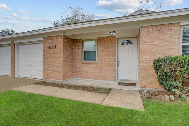 doorway to property featuring a garage