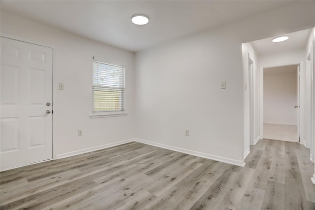 entryway with light hardwood / wood-style floors