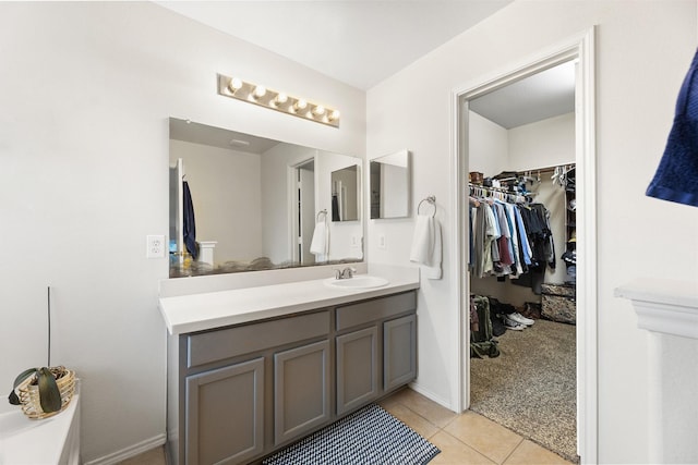 bathroom featuring tile patterned floors and vanity