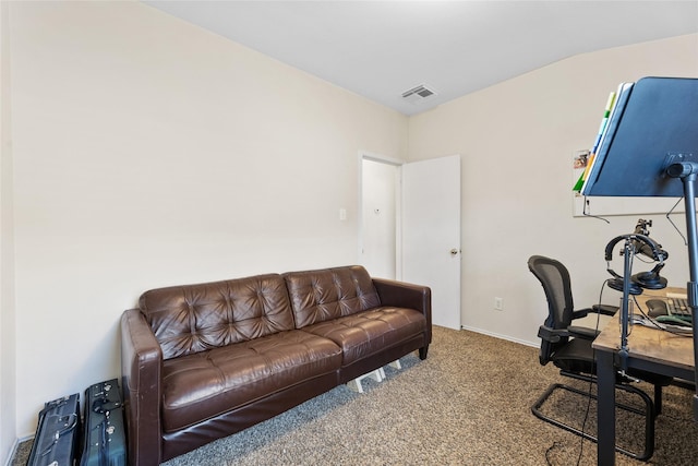 carpeted office space with lofted ceiling