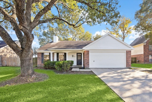 ranch-style house featuring covered porch, a garage, and a front lawn