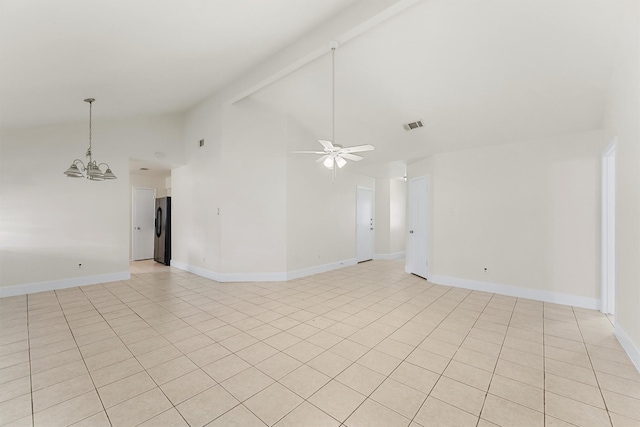 tiled spare room featuring beamed ceiling, high vaulted ceiling, and ceiling fan with notable chandelier