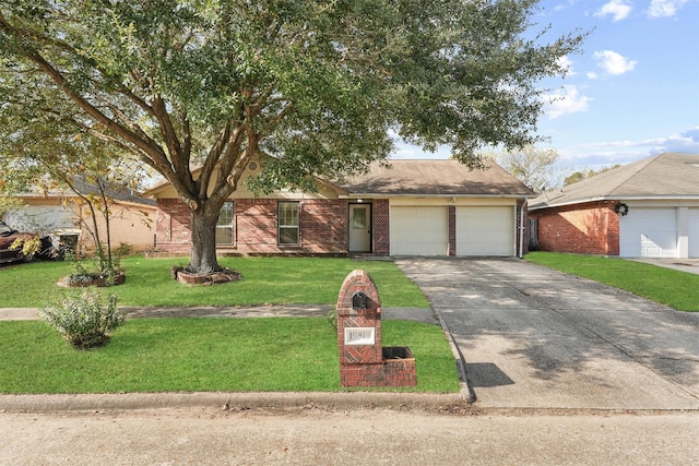 ranch-style home with a garage and a front lawn