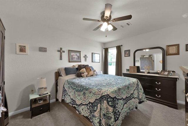 bedroom featuring ceiling fan and light colored carpet