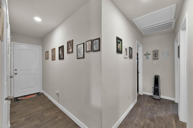 hallway featuring dark hardwood / wood-style flooring