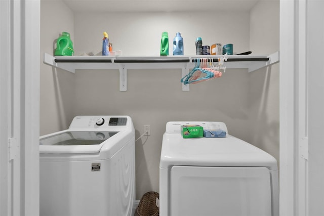 washroom featuring independent washer and dryer