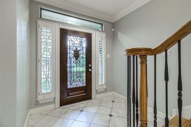 entryway with a healthy amount of sunlight and ornamental molding