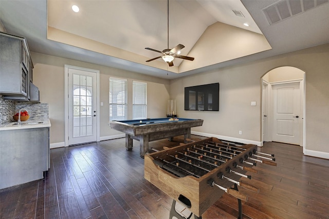 game room with ceiling fan, dark hardwood / wood-style flooring, lofted ceiling, and pool table