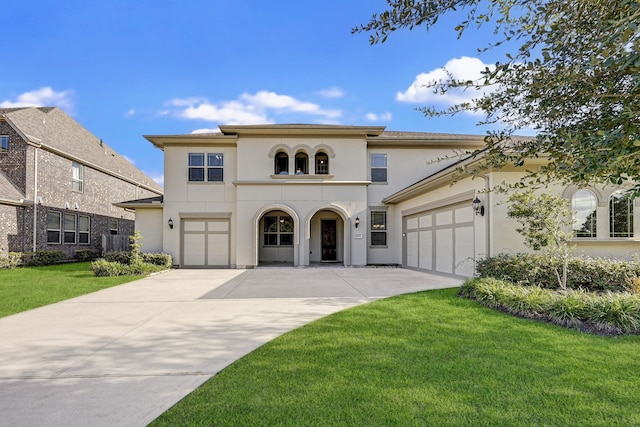 mediterranean / spanish-style home featuring a front yard