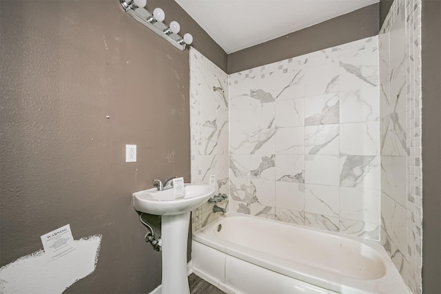 bathroom featuring a tub to relax in