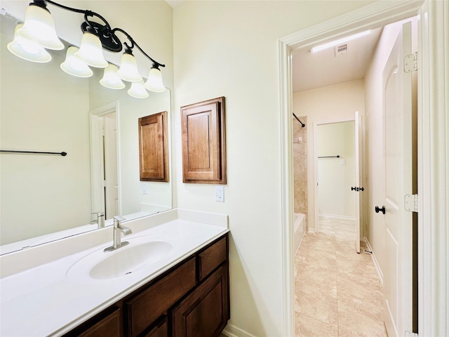 bathroom featuring vanity and shower / bathtub combination