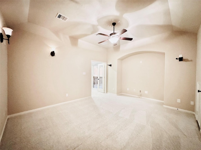 empty room with carpet floors, ceiling fan, and lofted ceiling