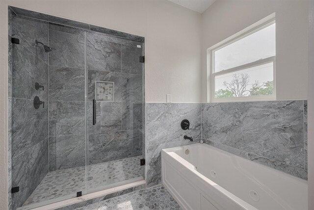 2206 Hoskins Dr, Houston, TX 77080 - bathroom featuring a whirlpool tub and a stall shower
