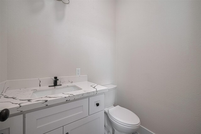 2206 Hoskins Dr, Houston, TX 77080 - half bath with toilet, vanity, and baseboards