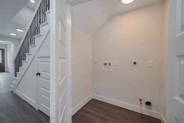 2206 Hoskins Dr, Houston, TX 77080 - laundry room featuring gas dryer hookup, washer hookup, electric dryer hookup, a textured ceiling, and dark wood-style flooring