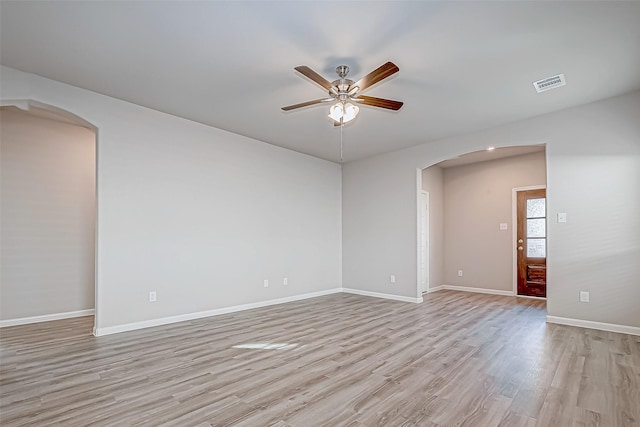 spare room with ceiling fan and light hardwood / wood-style floors