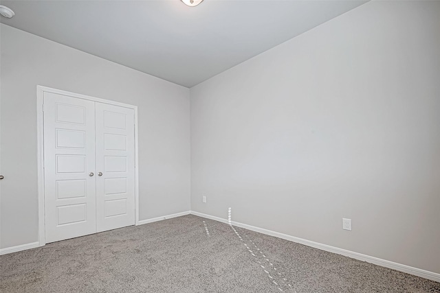 unfurnished room with carpet