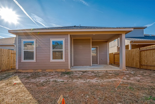 rear view of house featuring a patio area