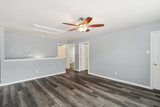 spare room with dark hardwood / wood-style floors and ceiling fan