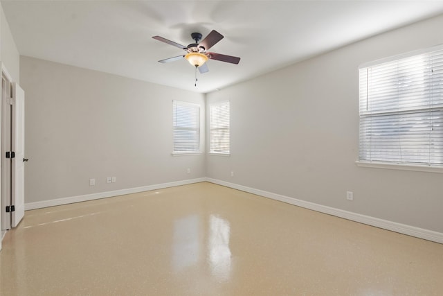 spare room featuring ceiling fan