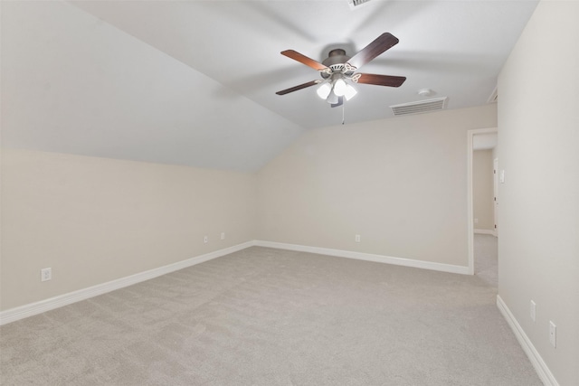 bonus room with light colored carpet, ceiling fan, and lofted ceiling