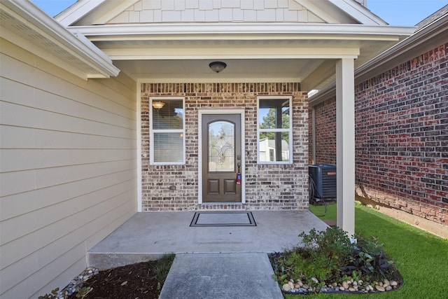 doorway to property with cooling unit