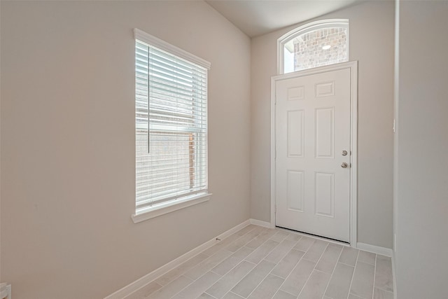 foyer featuring plenty of natural light