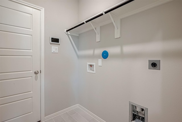 laundry area with electric dryer hookup, hookup for a gas dryer, hookup for a washing machine, and tile patterned flooring