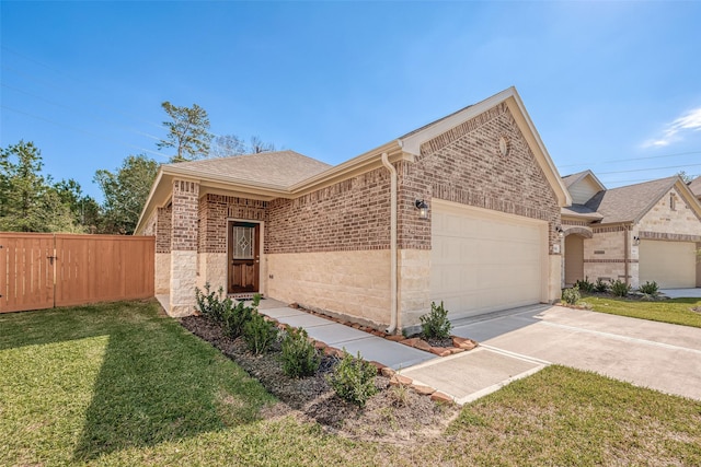 view of front of house with a garage and a front lawn