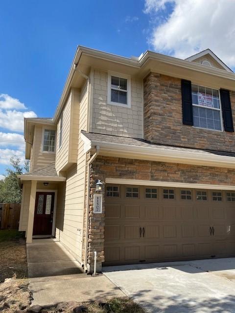 view of front of home with a garage