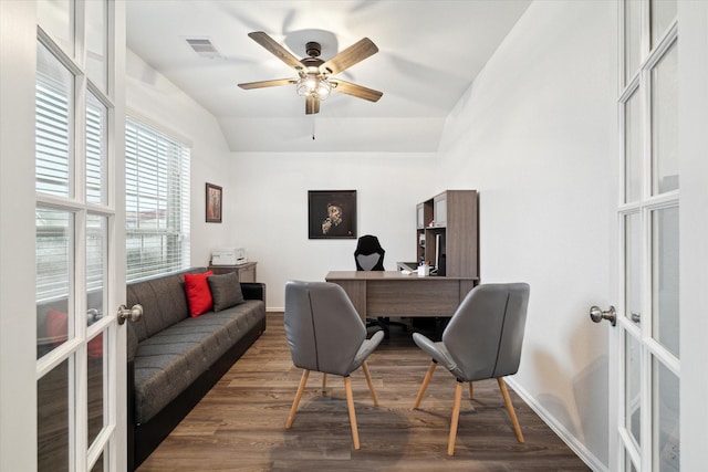 office featuring lofted ceiling, french doors, ceiling fan, and dark hardwood / wood-style floors