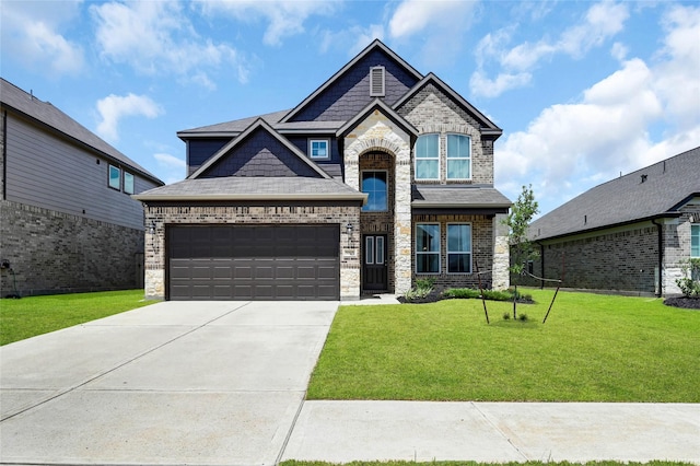 view of front facade with a garage and a front lawn