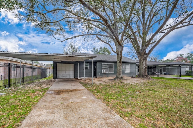 view of front of home with a carport, concrete driveway, an attached garage, and fence