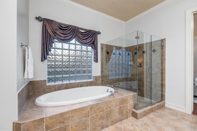 bathroom featuring tile patterned floors, crown molding, and independent shower and bath