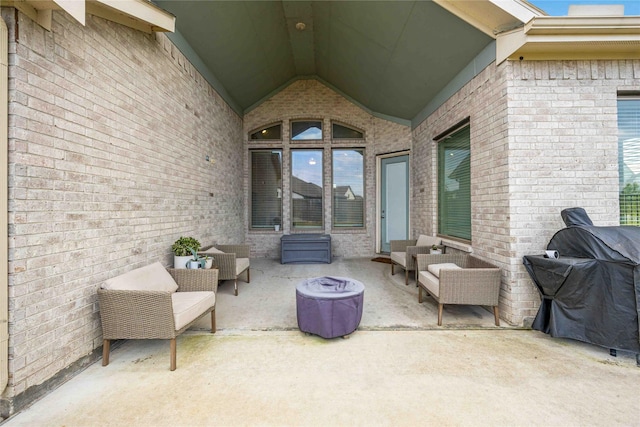 view of patio featuring an outdoor hangout area and a grill