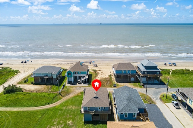 aerial view featuring a beach view and a water view