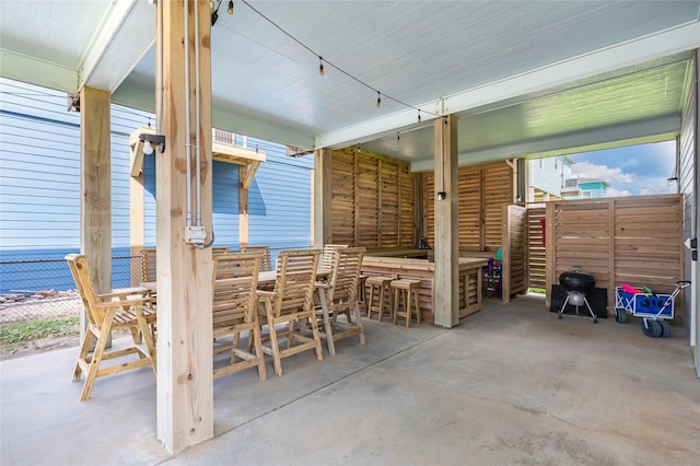 view of patio / terrace featuring exterior bar