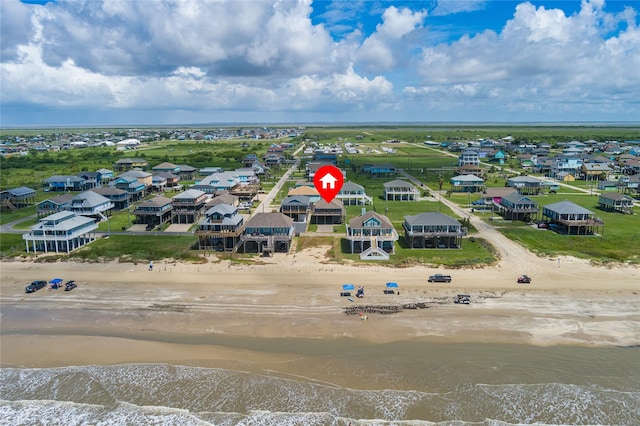 aerial view featuring a beach view and a water view